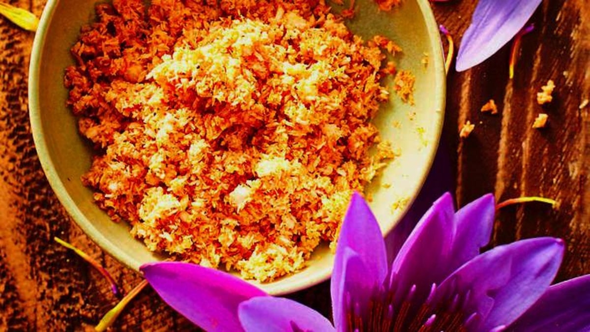 Bowl of food with purple flowers